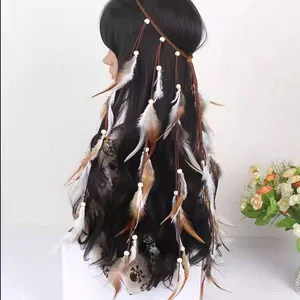 Bohemian ethnic style long tassel feather headband with beads on a mannequin head.