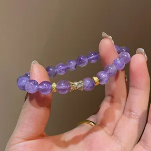 Elegant purple amethyst beaded bracelet with sparkling gold butterfly charm for women