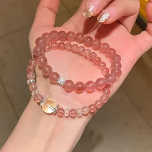 Elegant red agate and moonstone beaded bracelet with silver butterfly charm details