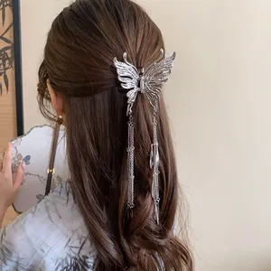 Elegant silver butterfly metal hair claw clip with long tassels for half-up hairstyles
