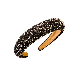 Elegant Korean fashion black headband with faux pearls and rhinestones for women.