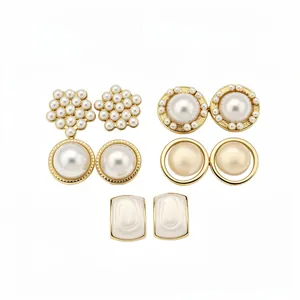 Elegant French vintage geometric pearl earring set featuring five diverse pairs of studs