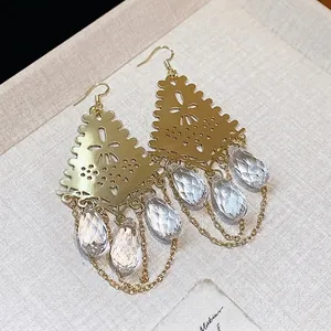 Elegant gold bohemian earrings featuring crystal glass teardrop pendants for women