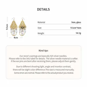 Bohemian style gold dangle earrings with glass teardrops and 925 silver needles.