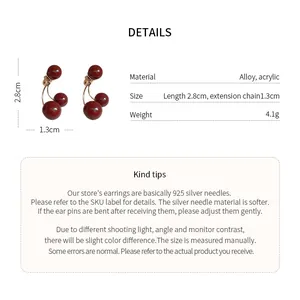 Detalles de pendientes de cereza roja con material de aleación y largo de 2,8 cm