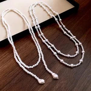 Elegant French vintage long pearl necklace set with baroque pearl droplet pendant