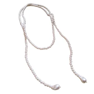 Elegant French vintage long pearl necklace featuring baroque drop pendants as sweater chain