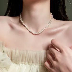 Detail shot of a sweet colorful beaded woven necklace worn on a female model's neck.
