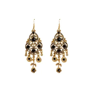 Vintage style gold-toned dangle earrings featuring black rhinestones and floral tassels