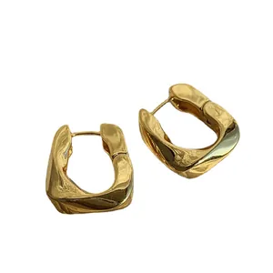 Elegant 18K gold-plated geometric twisted hoop earrings for women in French style