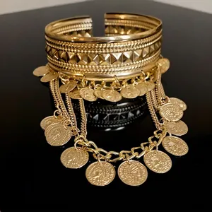 Luxury gold coin tassel open cuff bracelet featuring vintage relief design details