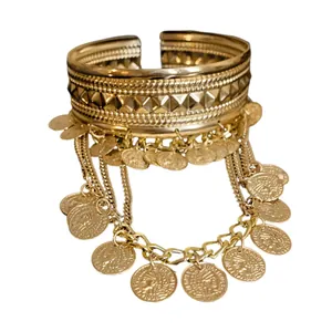 Bohemian gold cuff bracelet with dangling coin pendants and vintage fringe design