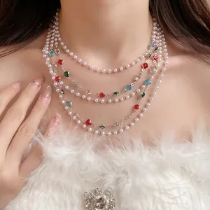 Elegant multi-layer pearl necklace with colorful gemstones in French vintage style.