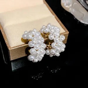 Elegant heart-shaped cluster pearl drop earrings with silver needle and hollow design