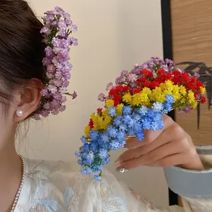 Elegant and romantic gypsophila flower hair pins for women in mori style floral aesthetic.