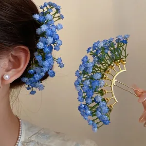 Elegant blue Gypsophila floral hair pin for women featuring a fan-shaped artistic design