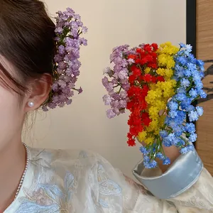 Detailed view of colorful baby's breath flower hair clips in sweet forest style