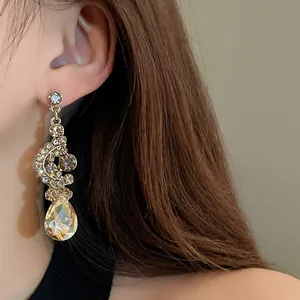 Vintage luxury teardrop crystal dangle earrings featuring elegant rhinestone pave for women
