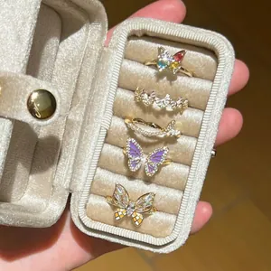 Exquisite set of five butterfly rings featuring colorful zircon, enamel and pearls in gold