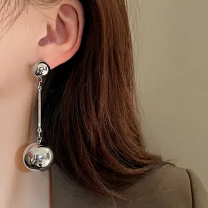 Minimalist metal ball tassel drop earrings with polished silver finish for women