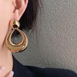 Boucles d'oreilles pendantes géométriques dorées pour femmes, fini métal brillant