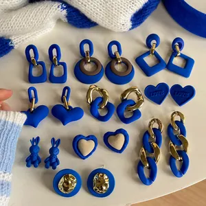Vintage Klein blue matte finish earrings collection with heart and geometric designs