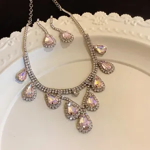 Elegant French luxury teardrop necklace and earring set with pink iridescent crystal rhinestones