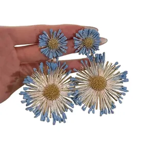 Stylish blue dopamine flower earrings with silver needles for a resort fashion look