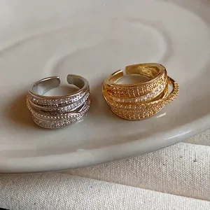 Elegant multi-layered zircon geometric open rings in gold and silver finishes