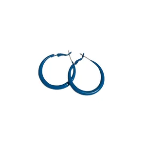 Klein blue hoop earrings with silver needles and minimalist fashion style