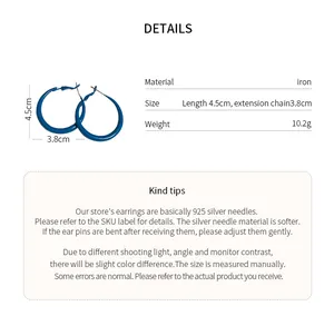Detailed view of Klein blue oversized hoop earrings with dimensions and weight info