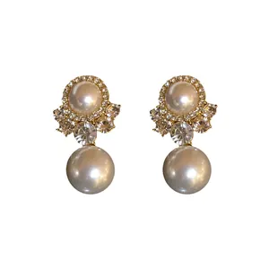 Vintage palace style pearl earrings with sparkly rhinestone floral accents
