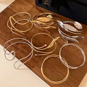 Fashionable gold and silver leaf cuff bracelets with minimalist open design jewelry