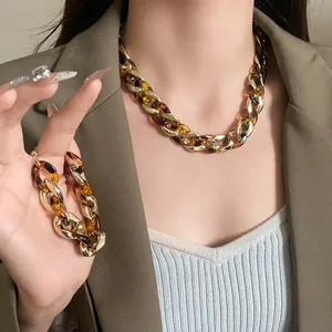 Chunky leopard print geometric chain necklace and bracelet set detail view