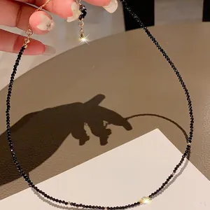 Minimalist black crystal faceted bead necklace with gold-tone accents for women