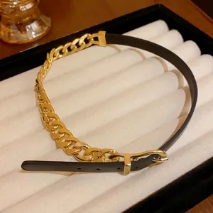 Edgy gold curb chain and black leather choker necklace with adjustable belt buckle