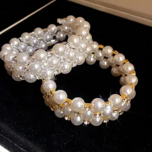 Elegant three-layer pearl bracelet with sparkling rhinestones and vintage French style