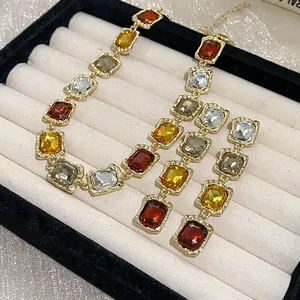 Detailed view of square multi-color rhinestone necklace and earring jewelry set