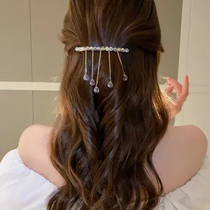 Elegant crystal tassel hair clip with sparkling waterdrop charms and gold chains