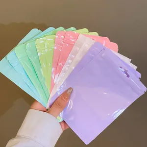 Detail showing a variety of macaron-colored thick ziplock bags for jewelry packaging