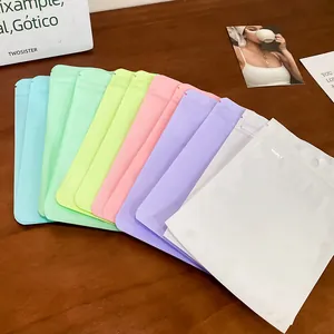 Detailed macro view of colorful pastel macaron zip-lock bags for jewelry packaging needs