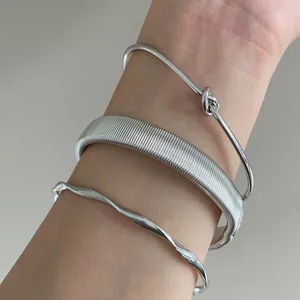 Minimalist set of three irregular geometric silver metal open cuff bangles for women