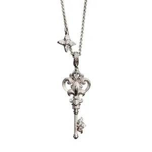 Ornate silver stainless steel key pendant necklace with sparkly zircon star charm decoration