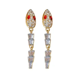 Elegant snake-shaped earrings with red crystal eyes and shimmering rhinestones