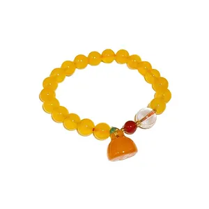 Handmade new Chinese style beaded bracelet with yellow crystals and orange fortune bag charm