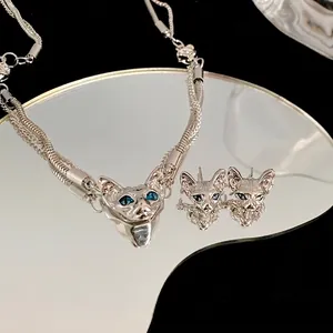 Cyberpunk Sphynx cat head jewelry set with blue crystal eyes and silver snake chain