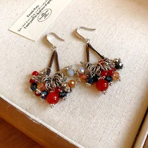 Handcrafted Bohemian retro style earrings featuring colorful glass beads and zircon accents