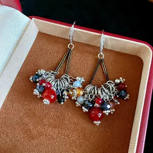 Retro Bohemian style dangle earrings with multi-colored glass beads and zircon detail
