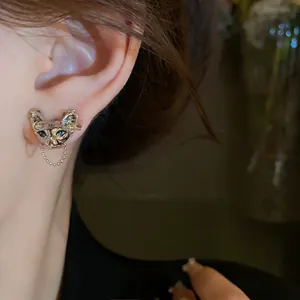 Unique cyberpunk cat head earring with metallic chain detail and edgy aesthetic design