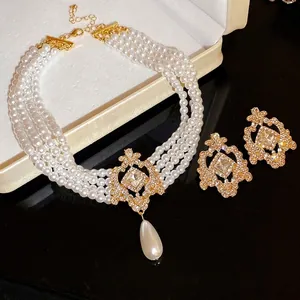 Vintage French palace style multi-strand pearl necklace and rhinestone earring set
